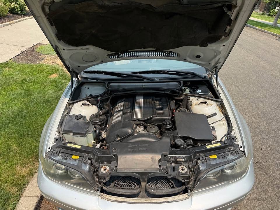 Engine bay: Complete, dry, and moderately dusty