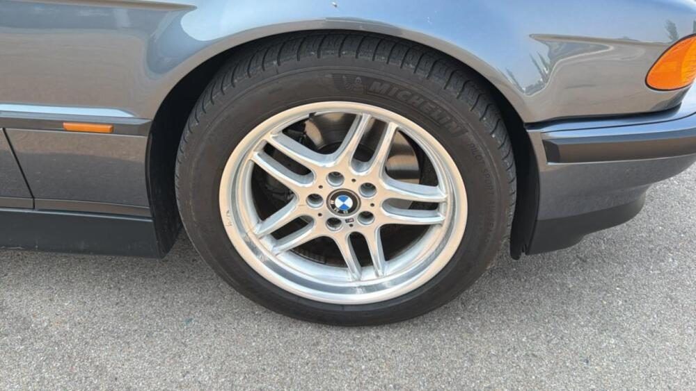 Front wheel and tire appear clean and intact